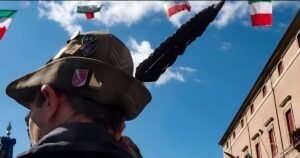 Man wearing Alpini hat